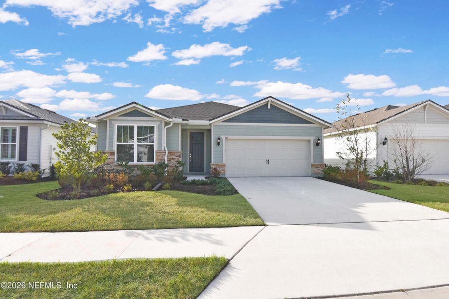 Front exterior of a new home in , St. Augustine, FL, highlighting curb appeal (Image 26).