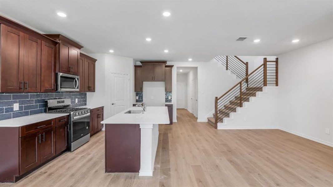 Furnished interior view inside a new home in The Landing at Hidden Lakes, McKinney (Image 6). Furnished interior view inside a new home in The Landing at Hidden Lakes, McKinney (Image 6).