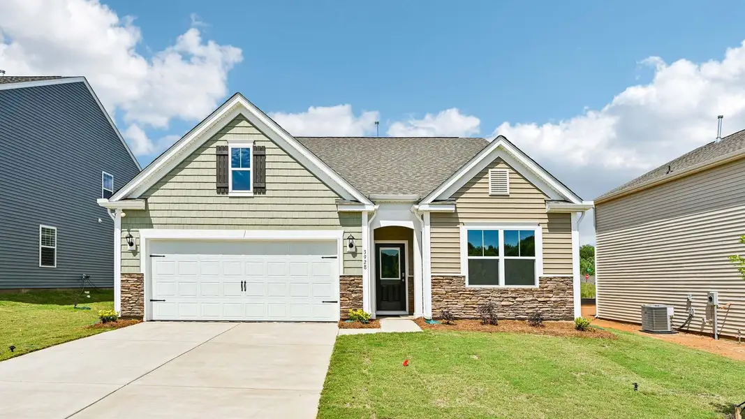Front exterior of a new home in Cline Village, Conover, NC, highlighting curb appeal (Image 1). Front exterior of a new home in Cline Village, Conover, NC, highlighting curb appeal (Image 1).