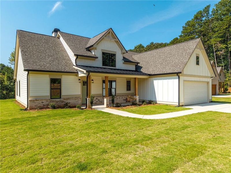 Front exterior of a new home in , Ellijay, GA, highlighting curb appeal (Image 28). Front exterior of a new home in , Ellijay, GA, highlighting curb appeal (Image 28).