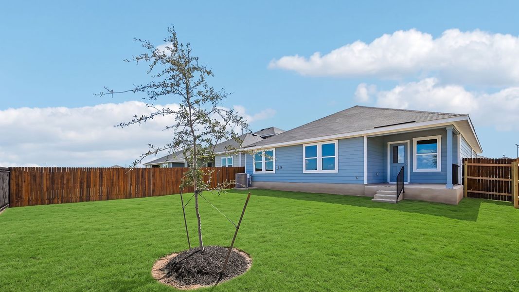 Exterior details and patio area of a home in Watermill, Uhland (Image 3).