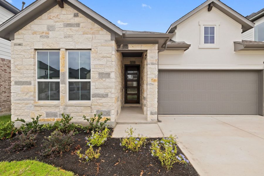 Exterior details and patio area of a home in Heritage, Dripping Springs (Image 3).