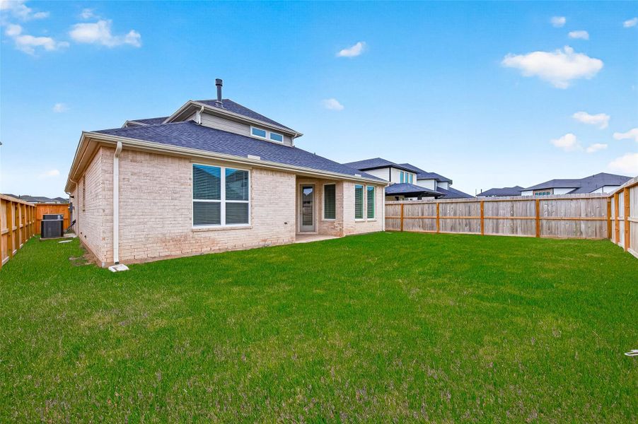 Home is complete with a two-car garage with remote opener, sprinkler system, rain gutters, and a backyard patio with a gas stub—perfect for outdoor grilling! Plenty of room for entertaining and outdoor activities!