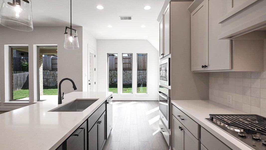 Furnished interior view inside a new home in Crosswinds, Kyle (Image 9).