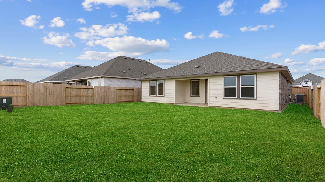 Exterior details and patio area of a home in Watermark, Alvin (Image 2).