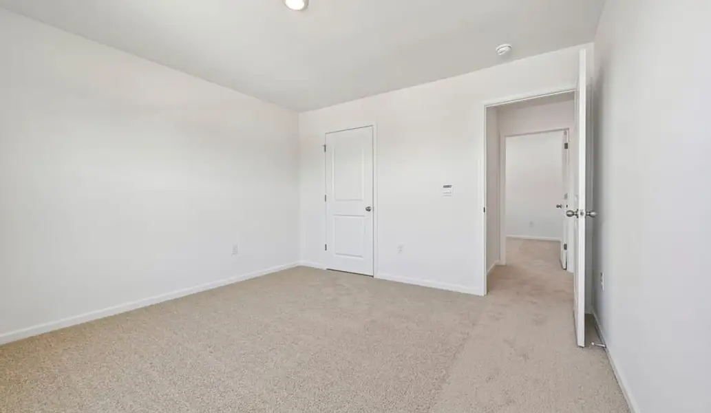 Spacious, unfurnished interior of a new home in Shahbain Reserve, Raeford (Image 27). Spacious, unfurnished interior of a new home in Shahbain Reserve, Raeford (Image 27).