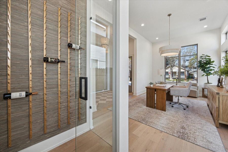 Elegant glass-enclosed wine closet, ideal for showcasing your wine collection in style.