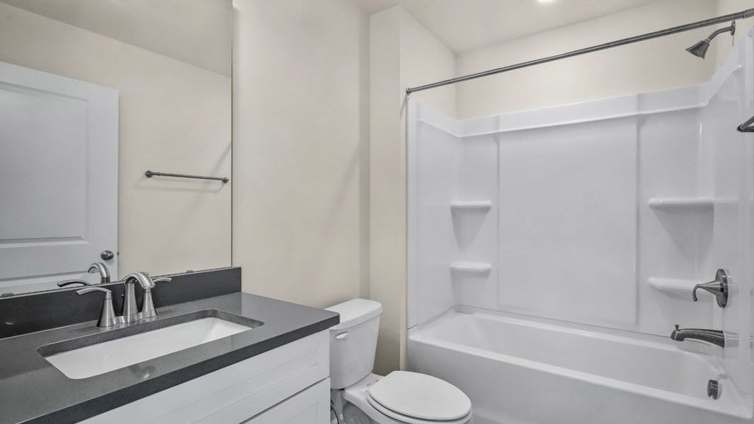 Representative furnished interior of a home built from the Linville by D.R. Horton in The Meadows at Kinsley, Jamestown (Image 8).