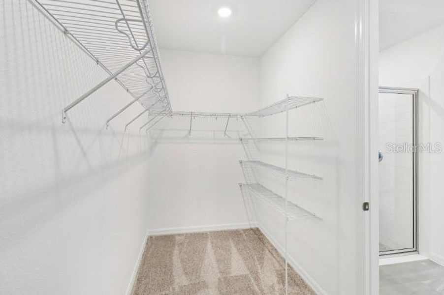 Spacious, unfurnished interior of a new home in Northlake at Ovation, Winter Garden (Image 23).