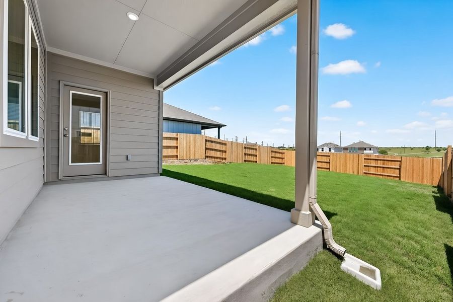 Exterior details and patio area of a home in Sunfield, Buda (Image 3). Exterior details and patio area of a home in Sunfield, Buda (Image 3).