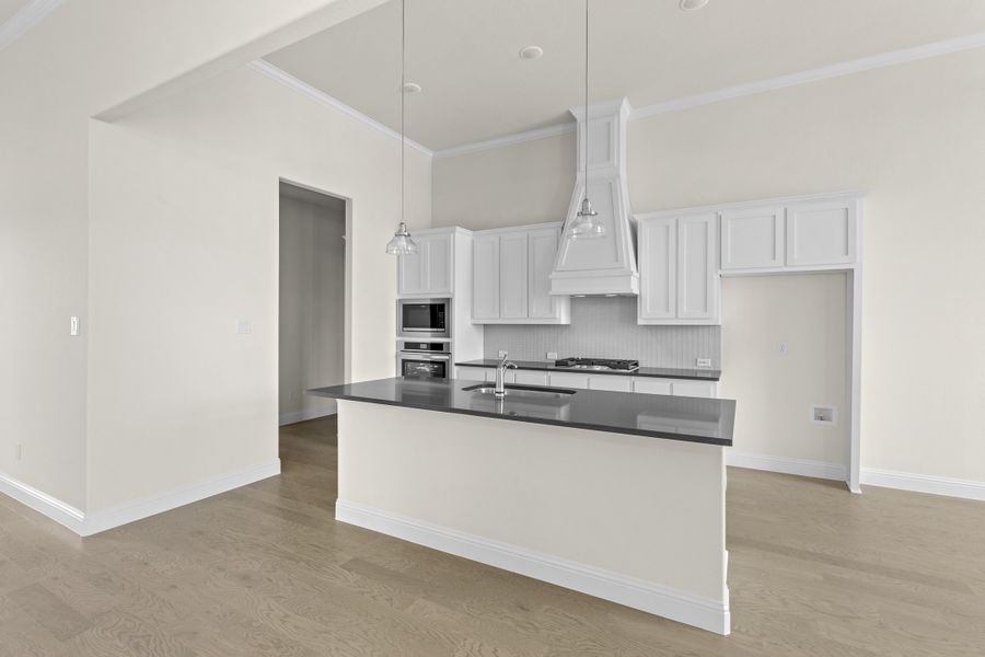 Representative furnished interior of a home built from the Wildwood SE by Sandlin Homes in Settler's Glen, New Fairview (Image 9).