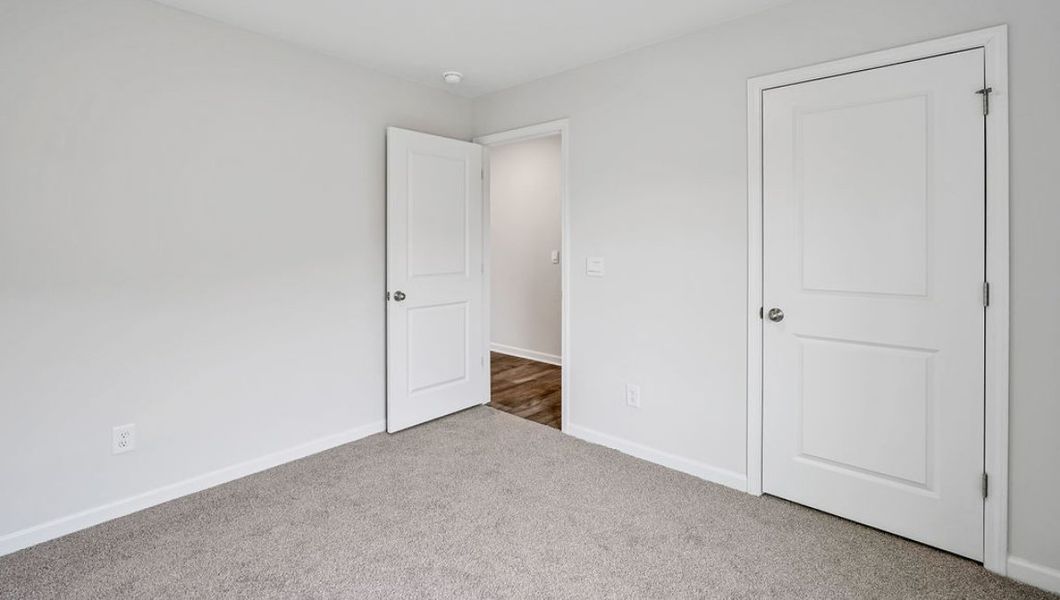 Spacious, unfurnished interior of a new home in Lockwood Landing, Supply (Image 21). Spacious, unfurnished interior of a new home in Lockwood Landing, Supply (Image 21).