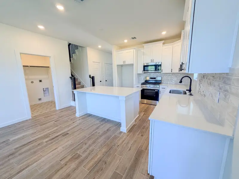 Furnished interior view inside a new home in Foxtail Palms, Manvel (Image 6).