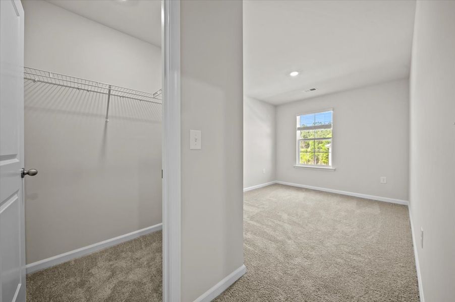 Representative unfurnished interior of a home built from the Palmetto II by McGuinn Homes in Clarke Townes, Anderson (Image 75).