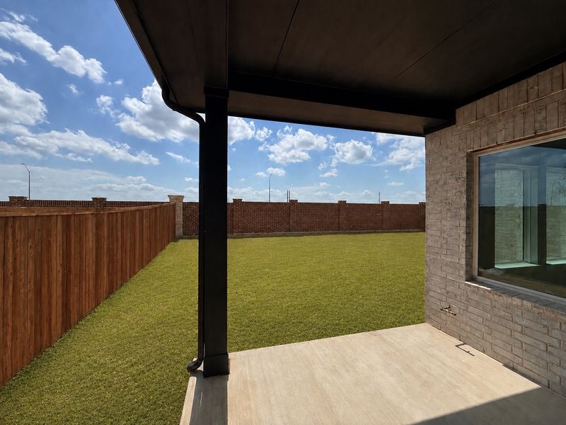 Exterior details and patio area of a home in Wildflower Ranch, Fort Worth (Image 12).