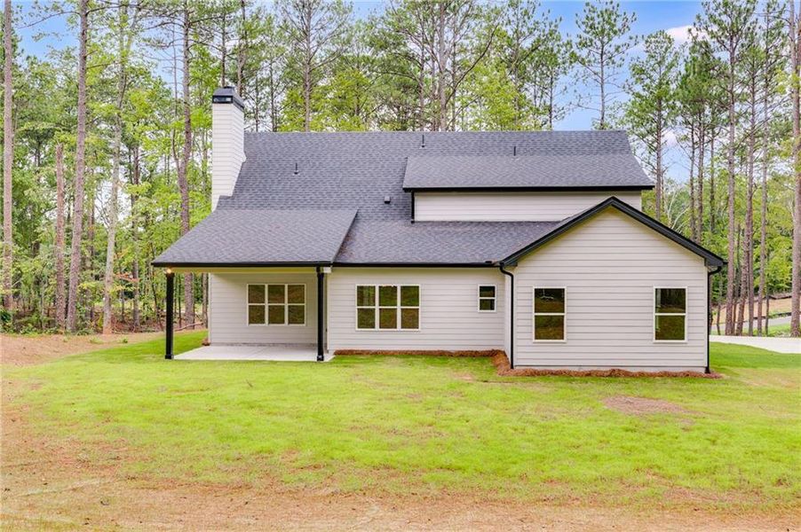 Front exterior of a new home in Liberty Station, Bremen, GA, highlighting curb appeal (Image 23).
