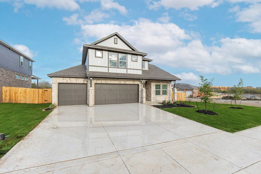 Front exterior of a new home in Stillwater Ranch, San Antonio, TX, highlighting curb appeal (Image 25).