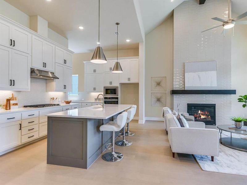 Can you imagine waking up to this gorgeous kitchen and living area every day?!