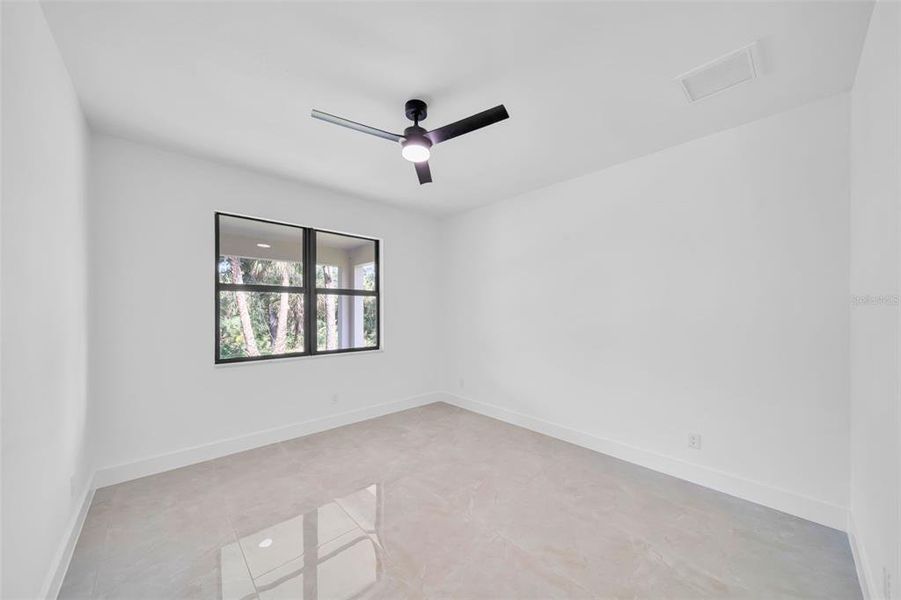 Spacious, unfurnished interior of a new home in , Port Charlotte (Image 21).