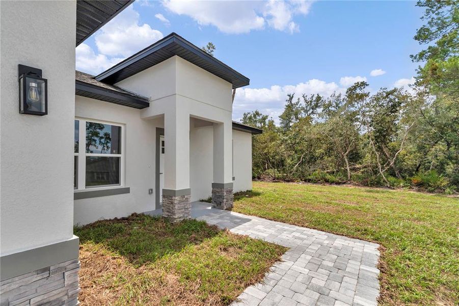 Exterior details and patio area of a home in , Ocala (Image 24).