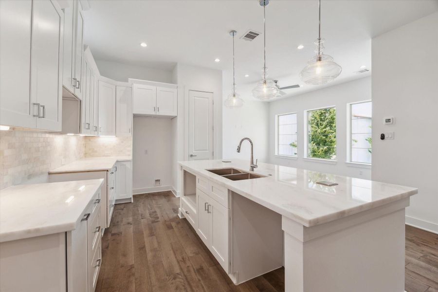 Kitchen is Light and Bright * White Cabinets * Marble Counters * Stainless Steel Appliances are Coming. Kitchen is Light and Bright * White Cabinets * Marble Counters * Stainless Steel Appliances are Coming.