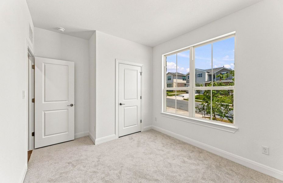 Spacious, unfurnished interior of a new home in Saddleback at Santa Rita Ranch, Liberty Hill (Image 44).