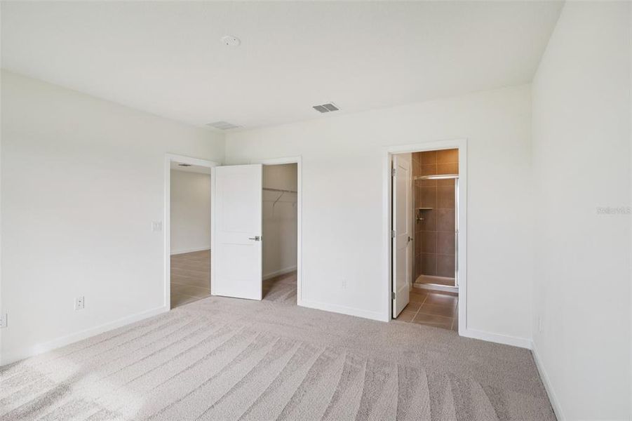 Spacious, unfurnished interior of a new home in Grasslands West, Lakeland (Image 21).