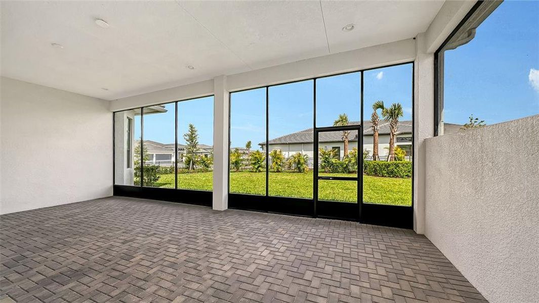 Exterior details and patio area of a home in Artistry Sarasota, Sarasota (Image 3).