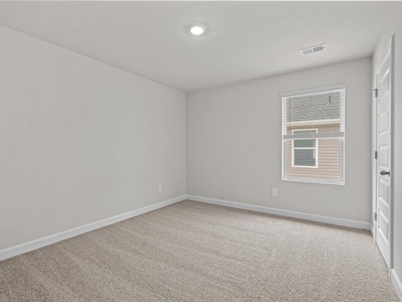 Spacious, unfurnished interior of a new home in Brayfield Manor - Heritage Collection, Wellford (Image 19).