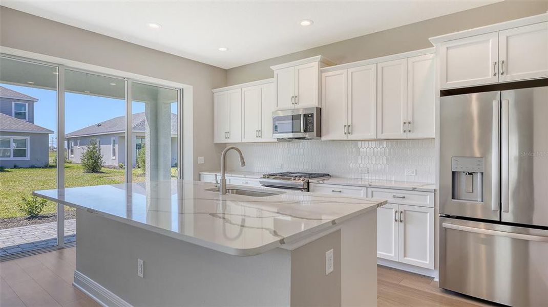 Furnished interior view inside a new home in Wildleaf, Parrish (Image 2).