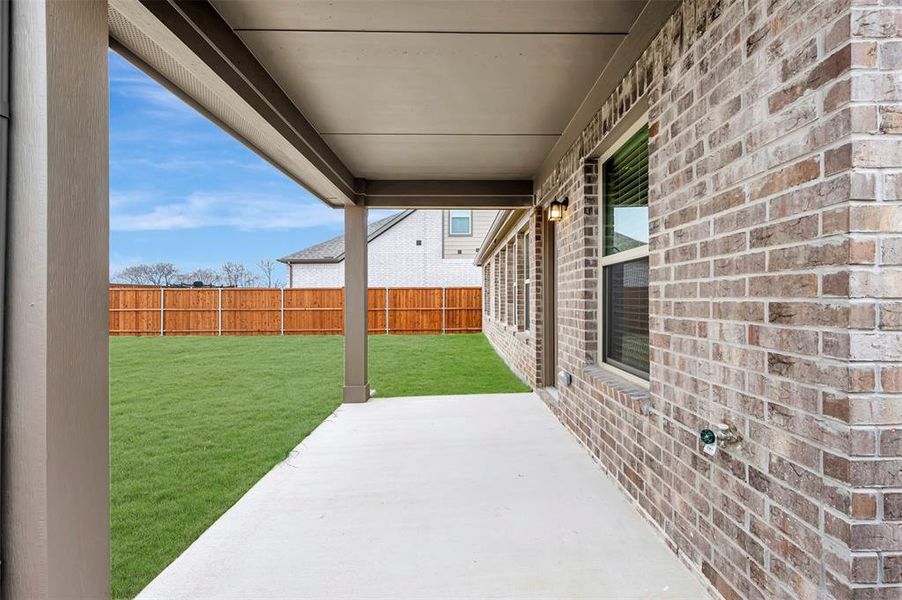Exterior details and patio area of a home in The Preserve, Justin (Image 3). Exterior details and patio area of a home in The Preserve, Justin (Image 3).