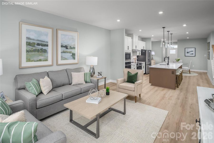 Living space that flows effortlessly into the kitchen—perfect for relaxing or gathering. Living space that flows effortlessly into the kitchen—perfect for relaxing or gathering.