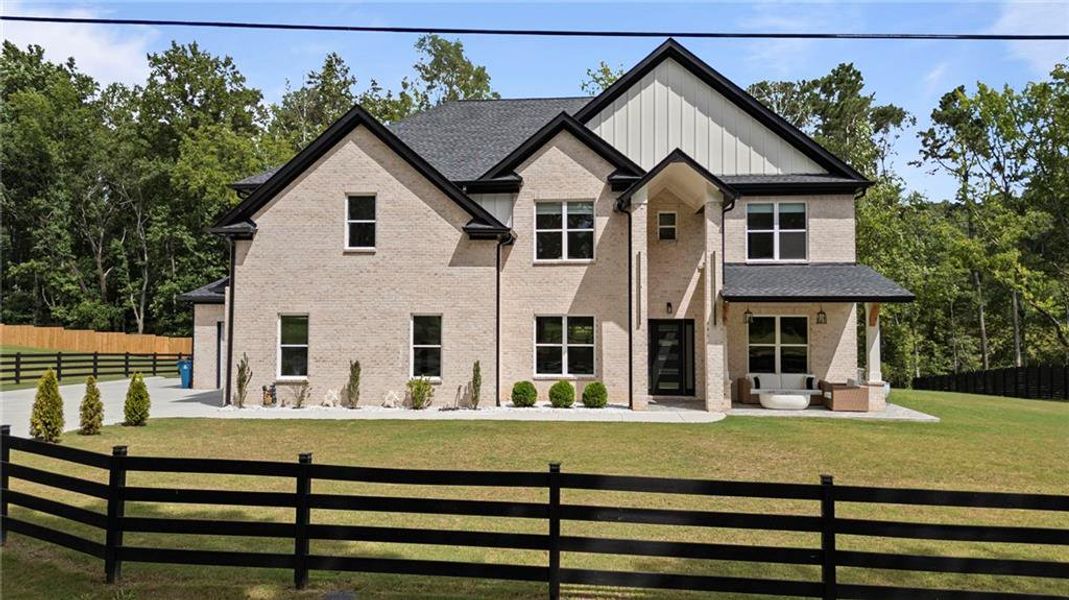 Front exterior of a new home in , Lawrenceville, GA, highlighting curb appeal (Image 19).