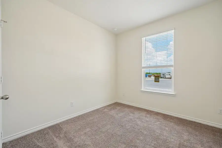 Spacious, unfurnished interior of a new home in Preserve at Culebra - Sterling Collection, San Antonio (Image 15).