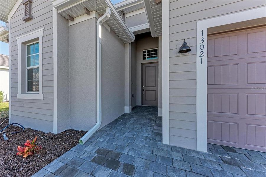 Exterior details and patio area of a home in Wellen Park Golf & Country Club: Executive Homes, Venice (Image 23).