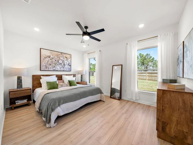 Furnished interior view inside a new home in Sunterra, Katy (Image 5).