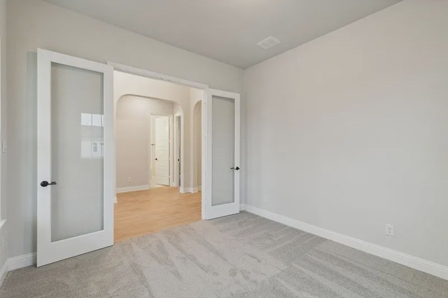 Representative unfurnished interior of a home built from the Logan by Cambridge Homes in Lake Park, Rowlett (Image 16).