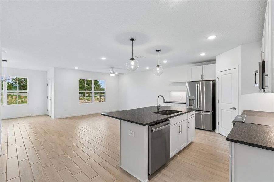 Furnished interior view inside a new home in Aspire at Canter Creek, Davenport (Image 4).
