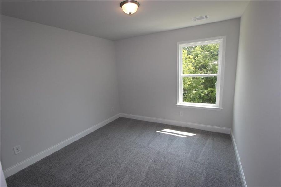 Spacious, unfurnished interior of a new home in Clark Farms, Flowery Branch (Image 24).