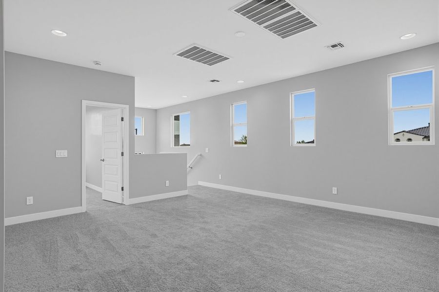 Spacious, unfurnished interior of a new home in Rancho Mercado, Surprise (Image 26).
