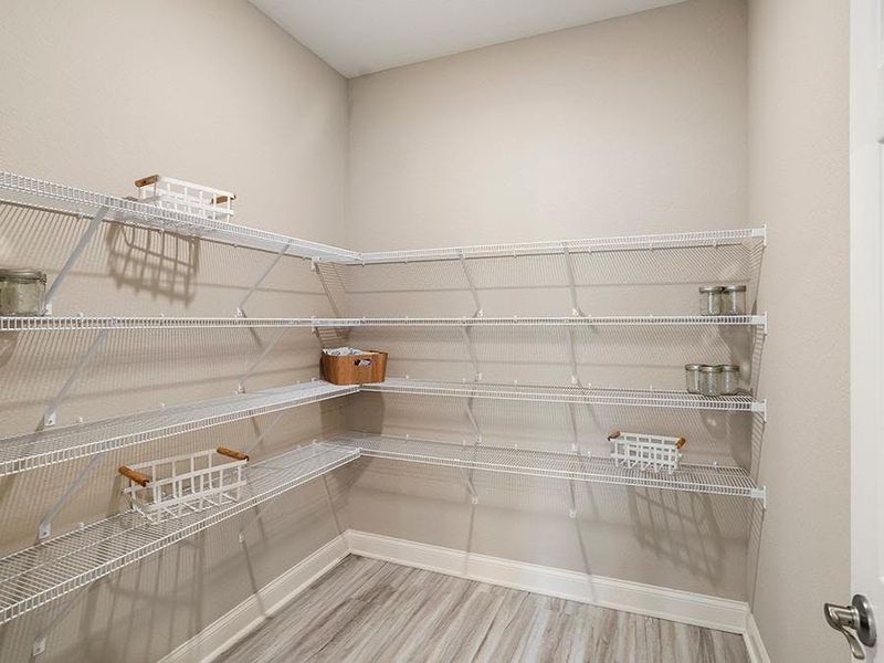 Enjoy the storage convenience of a walk-in pantry.