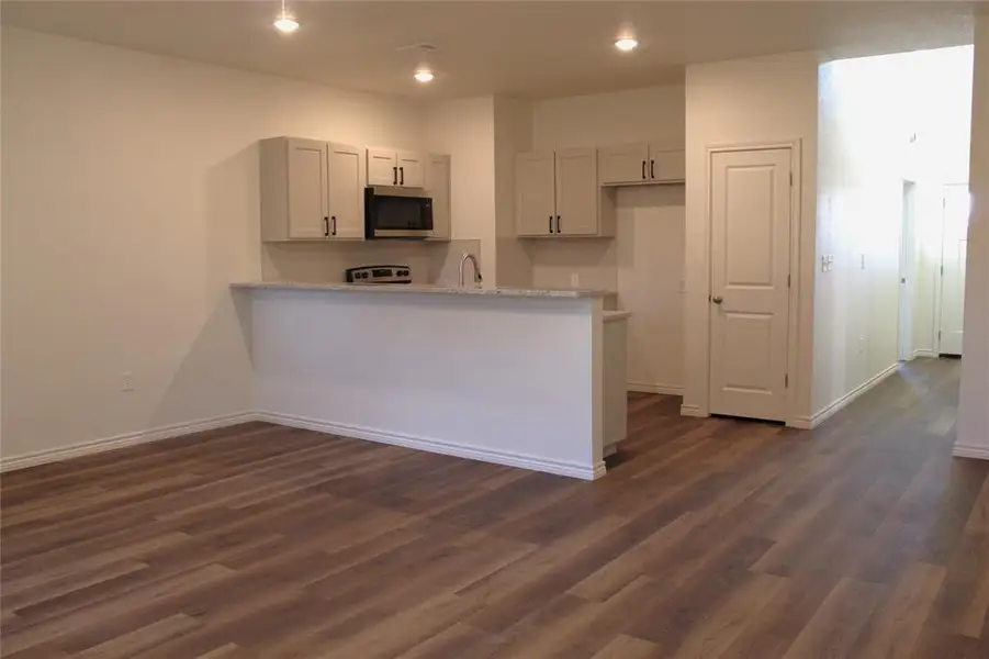 Spacious, unfurnished interior of a new home in , Stephenville (Image 15).