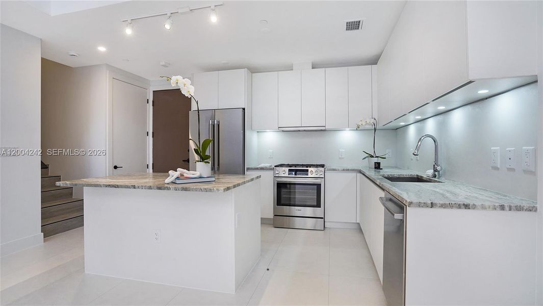 Furnished interior view inside a new home in , Miami (Image 10).