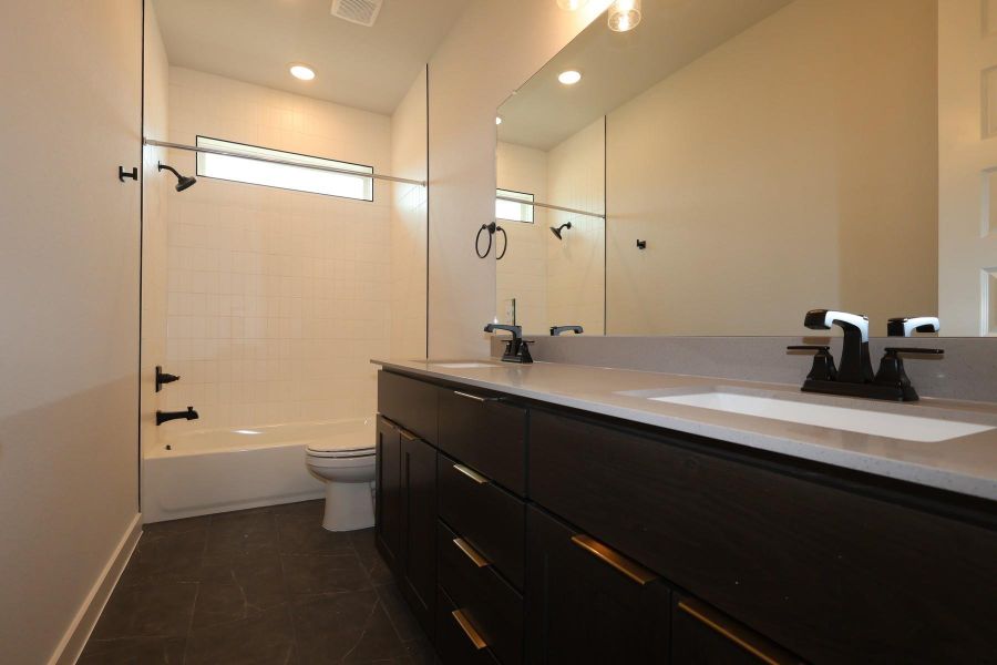 Furnished interior view inside a new home in Wolf Ranch, Georgetown (Image 11).