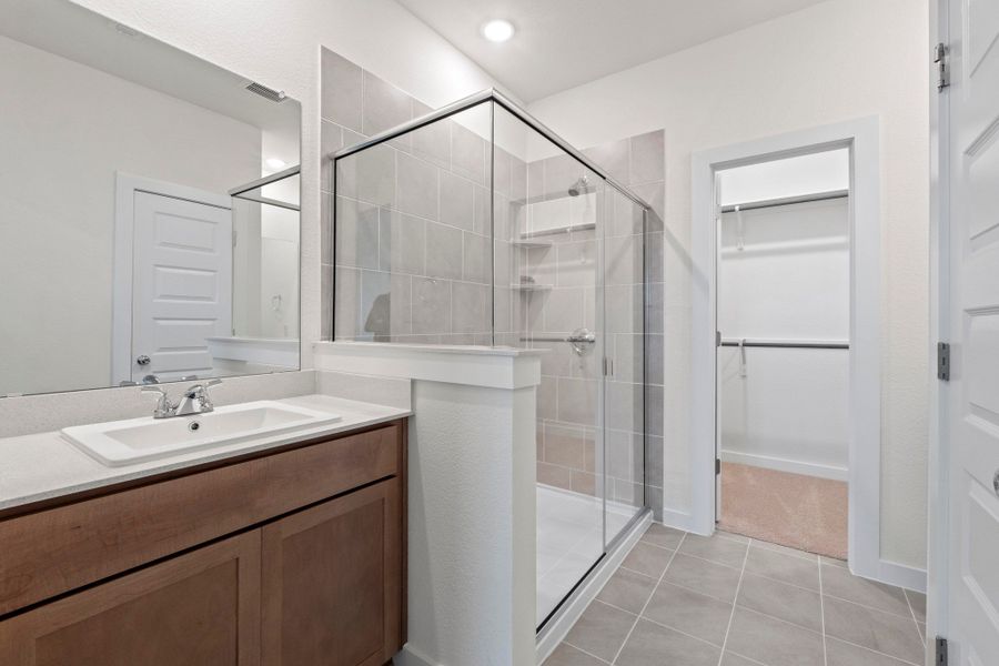 Primary Bathroom in the Pearl home plan by Trophy Signature Homes – REPRESENTATIVE PHOTO Primary Bathroom in the Pearl home plan by Trophy Signature Homes – REPRESENTATIVE PHOTO