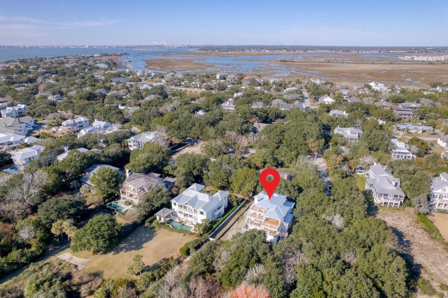 Front exterior of a new home in , Sullivan's Island, SC, highlighting curb appeal (Image 8).