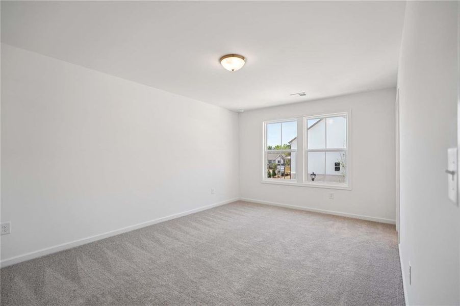 Spacious, unfurnished interior of a new home in Arbors at Richland Creek, Buford (Image 13).