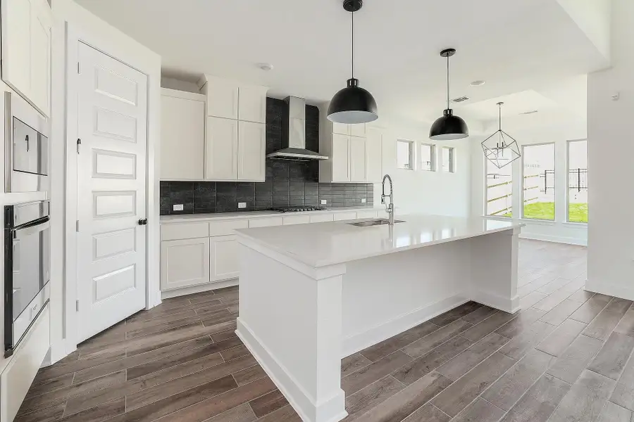 Furnished interior view inside a new home in Lakeside at Tessera - 50', Lago Vista (Image 6).