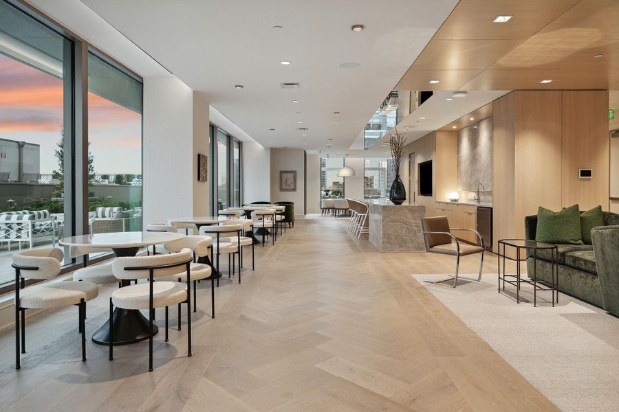 Multiple cozy couches and tables are perfect for poolside snacks, games and gatherings with neighbors in the resident's lounge.