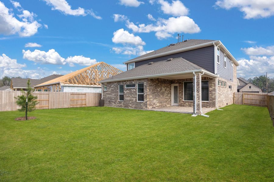 Exterior details and patio area of a home in The Trails, New Caney (Image 3).